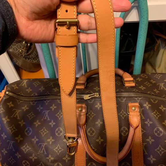 Authentic Louis Vuitton Keepall55 with strap - Picture 10 of 14